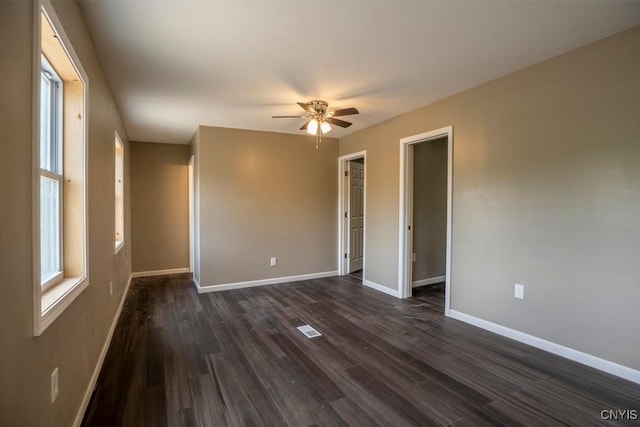 2707 State Route 48, Minetto, NY 13115 - unfurnished room with dark wood finished floors, a ceiling fan, and baseboards