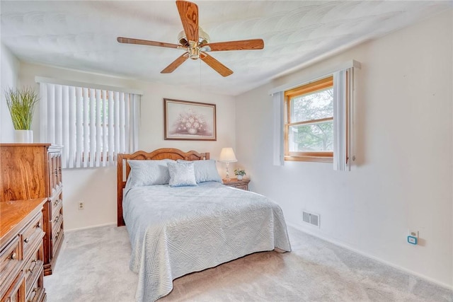 173 Dorian Ln, Greece, NY 14626 - bedroom with light colored carpet, baseboards, and a ceiling fan
