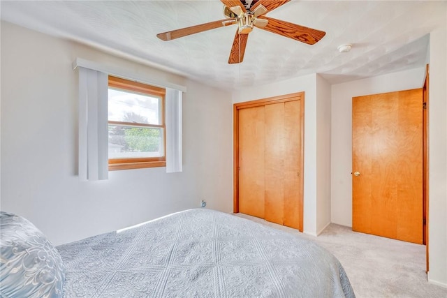 173 Dorian Ln, Greece, NY 14626 - unfurnished bedroom featuring carpet floors, a closet, and a ceiling fan