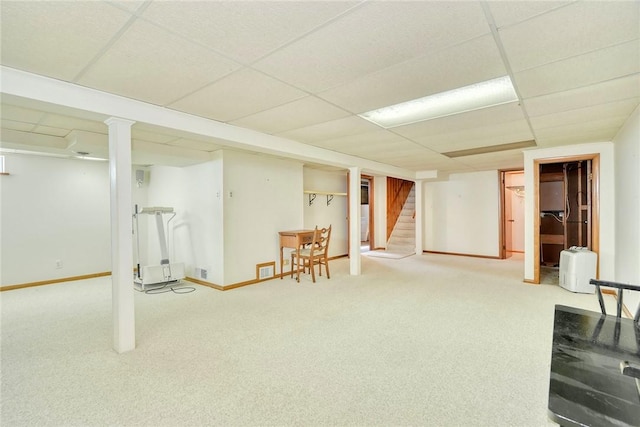 173 Dorian Ln, Greece, NY 14626 - finished below grade area with a paneled ceiling, stairway, carpet, and baseboards