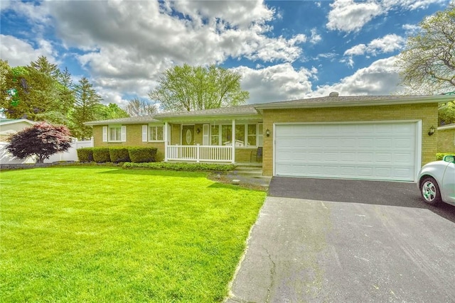 173 Dorian Ln, Greece, NY 14626 - ranch-style home with brick siding, a porch, asphalt driveway, and a front lawn