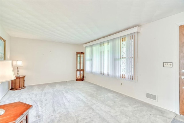 173 Dorian Ln, Greece, NY 14626 - unfurnished living room with carpet