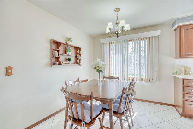 173 Dorian Ln, Greece, NY 14626 - dining area with a chandelier, baseboards, and light tile patterned flooring