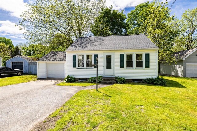 1184 Osband Ave, Macedon, NY 14502 - view of front of house with a front yard, driveway, and entry steps