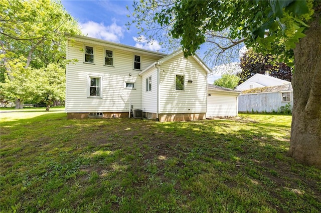 1184 Osband Ave, Macedon, NY 14502 - rear view of property with a yard and central AC unit