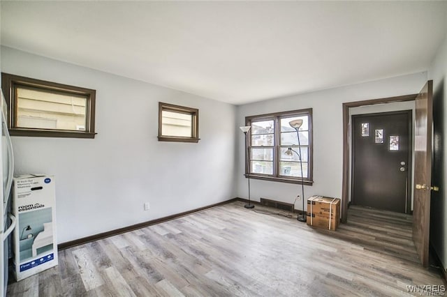 417 24th St, Niagara Falls, NY 14303 - unfurnished room with wood finished floors and baseboards