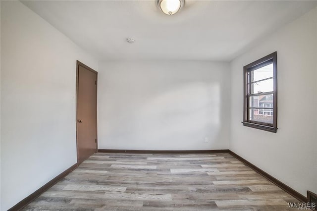 417 24th St, Niagara Falls, NY 14303 - unfurnished room featuring wood finished floors and baseboards