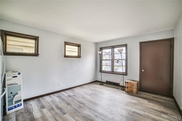 417 24th St, Niagara Falls, NY 14303 - spare room featuring wood finished floors and baseboards