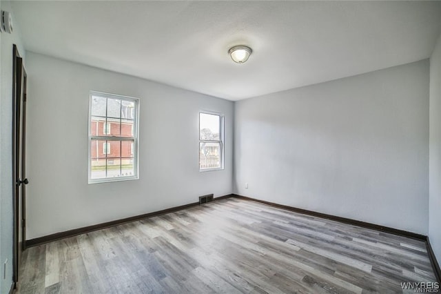 417 24th St, Niagara Falls, NY 14303 - spare room with wood finished floors and baseboards