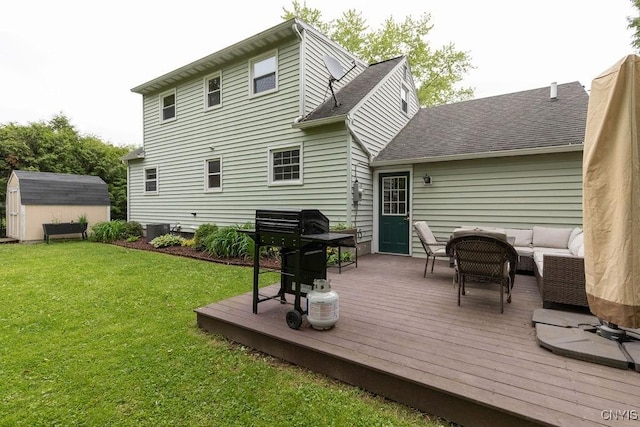 114 Osborne Dr, Manlius, NY 13057 - rear view of house featuring a yard, a deck, central AC unit, an outdoor hangout area, and roof with shingles