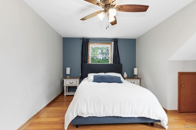114 Osborne Dr, Manlius, NY 13057 - bedroom with light wood finished floors, baseboards, and a ceiling fan