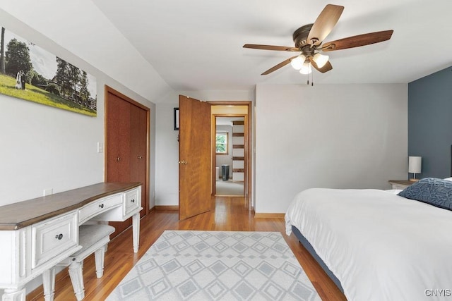 114 Osborne Dr, Manlius, NY 13057 - bedroom featuring wood finished floors, an office area, and baseboards