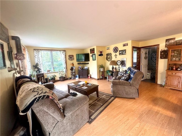 405 County Highway 12, Laurens, NY 13796 - living area with wood finished floors