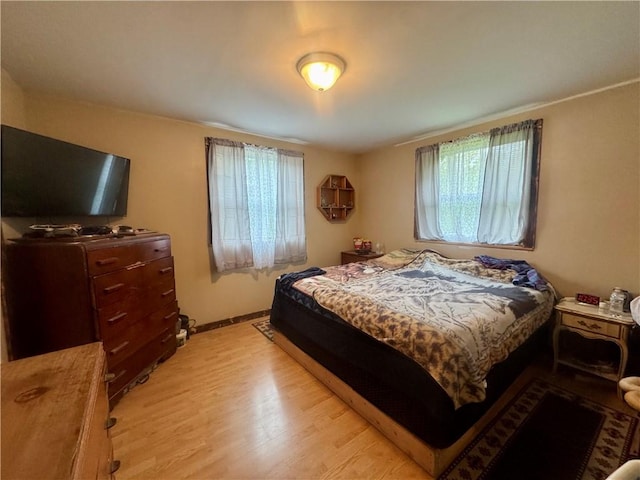 405 County Highway 12, Laurens, NY 13796 - bedroom with light wood-style floors and baseboards