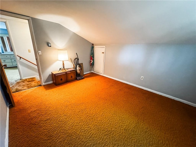 6794 Fosterville Rd, Aurelius, NY 13021 - additional living space with light colored carpet, baseboards, and vaulted ceiling