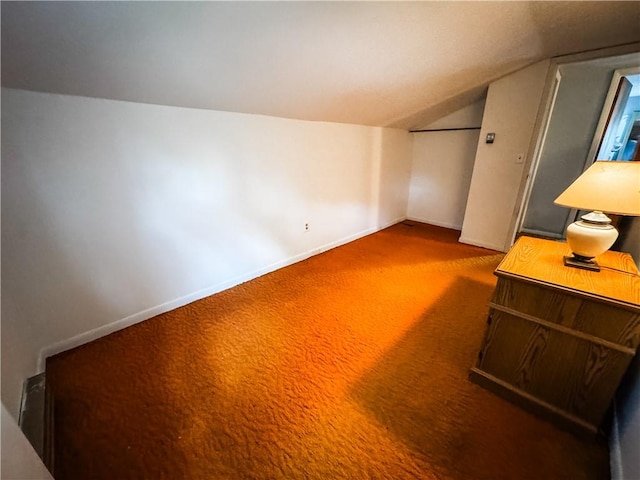 6794 Fosterville Rd, Aurelius, NY 13021 - bonus room featuring carpet floors, lofted ceiling, and baseboards