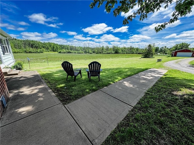 6794 Fosterville Rd, Aurelius, NY 13021 - view of green lawn featuring a detached garage