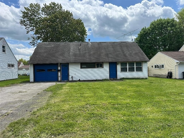442 Euclid Rd, Utica, NY 13502 - cape cod-style house featuring a garage, driveway, and a front lawn