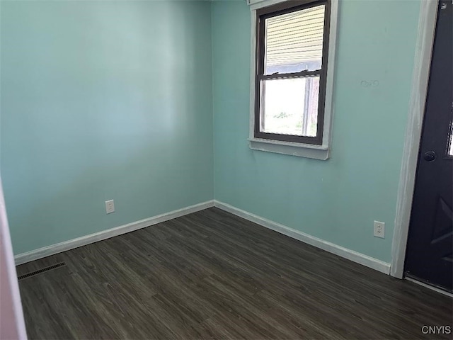 442 Euclid Rd, Utica, NY 13502 - empty room featuring baseboards and dark wood-type flooring
