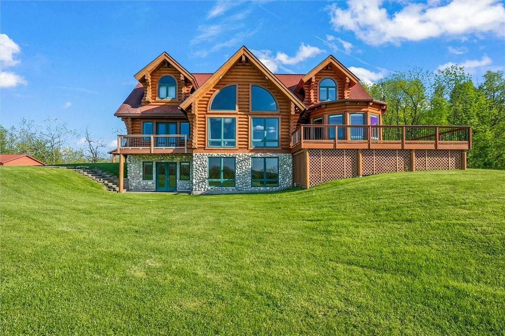 6557 Vincent Hill Rd, Bristol, NY 14424 - back of house with log exterior, a yard, stone siding, and a wooden deck
