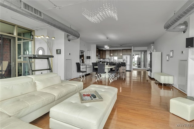 132 Lakefront Blvd Unit 403, Buffalo, NY 14202 - living area with light wood-style floors