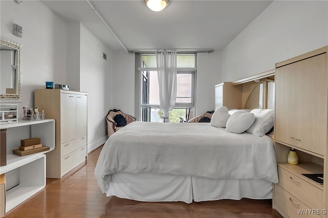 132 Lakefront Blvd Unit 403, Buffalo, NY 14202 - bedroom featuring wood finished floors