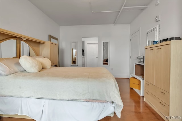 132 Lakefront Blvd Unit 403, Buffalo, NY 14202 - bedroom with wood finished floors and baseboards