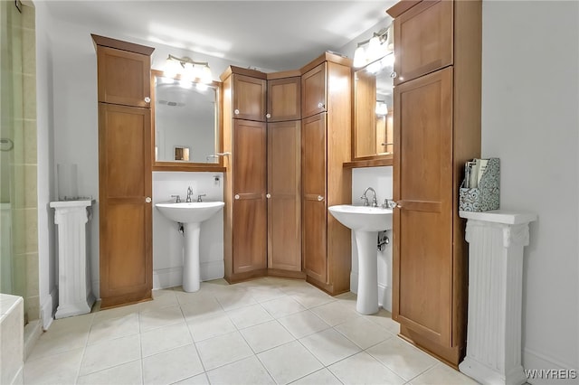 132 Lakefront Blvd Unit 403, Buffalo, NY 14202 - full bath featuring a sink and tile patterned flooring