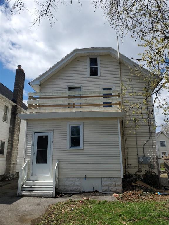 21 Manitou St, Rochester, NY 14621 - back of property with entry steps and a balcony