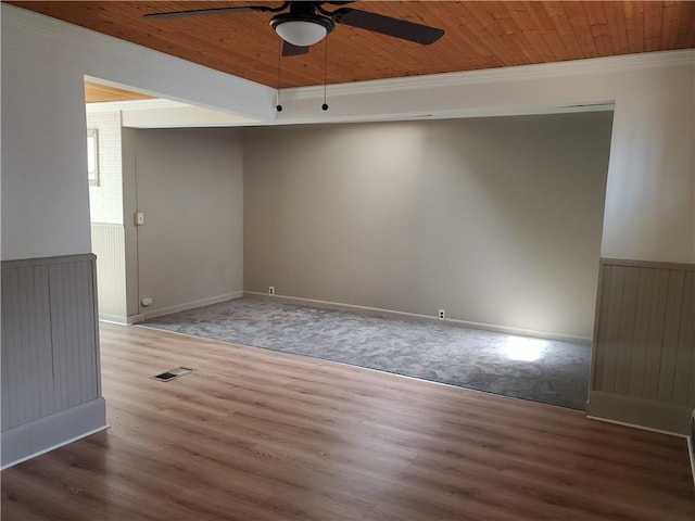 21 Manitou St, Rochester, NY 14621 - unfurnished room featuring ceiling fan, wood ceiling, wood finished floors, crown molding, and baseboards