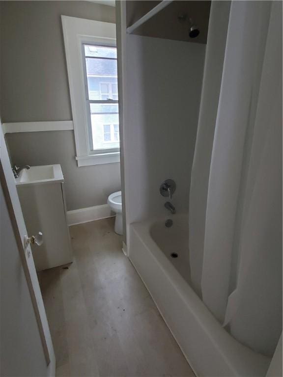 21 Manitou St, Rochester, NY 14621 - bathroom with toilet, vanity, baseboards, concrete floors, and shower / bath combo