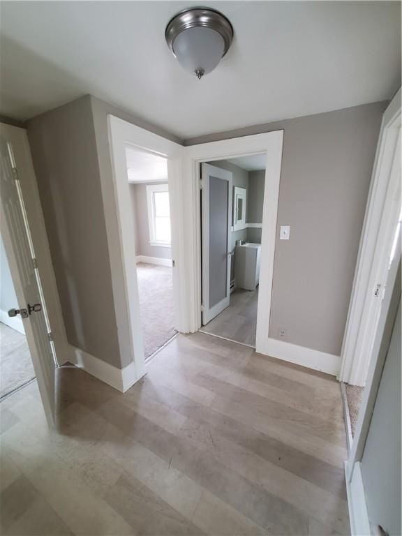 21 Manitou St, Rochester, NY 14621 - corridor featuring baseboards and light wood-style floors