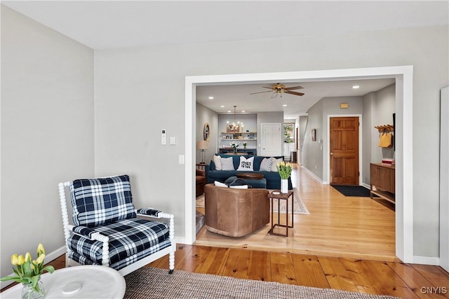 18 E Genesee St Unit 1, Skaneateles, NY 13152 - living room with wood finished floors, baseboards, recessed lighting, and ceiling fan