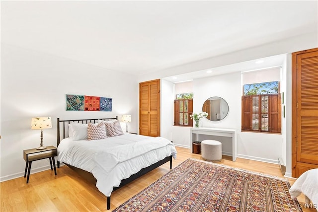 18 E Genesee St Unit 1, Skaneateles, NY 13152 - bedroom with light wood-style floors, baseboards, and recessed lighting