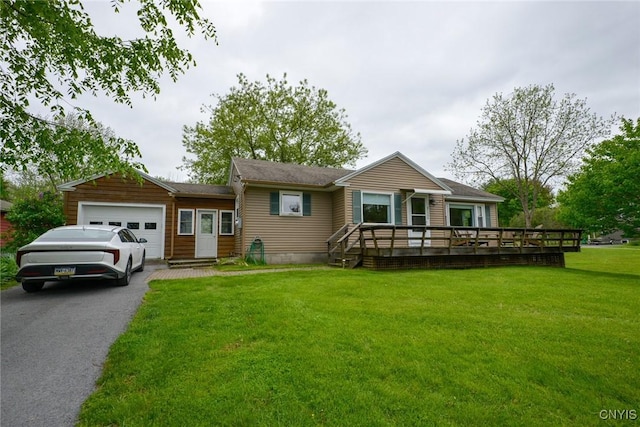 47388 Dingman Point Rd, Alexandria, NY 13607 - ranch-style home featuring an attached garage, a front lawn, asphalt driveway, and a wooden deck