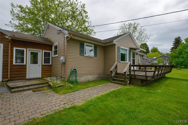 47388 Dingman Point Rd, Alexandria, NY 13607 - view of front facade featuring a wooden deck and a front yard