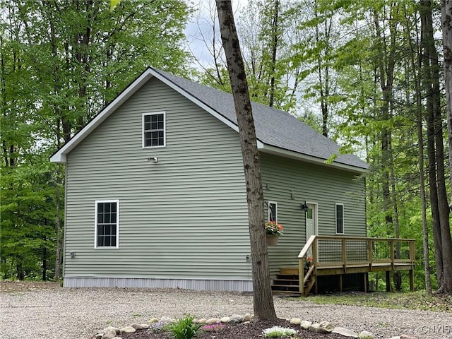 4456 Palmer Rd, Annsville, NY 13471 - view of side of property featuring a wooden deck and roof with shingles