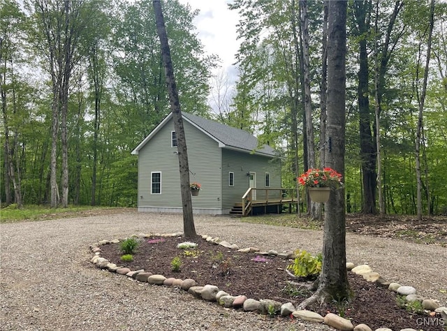 4456 Palmer Rd, Annsville, NY 13471 - view of side of property with gravel driveway and a deck