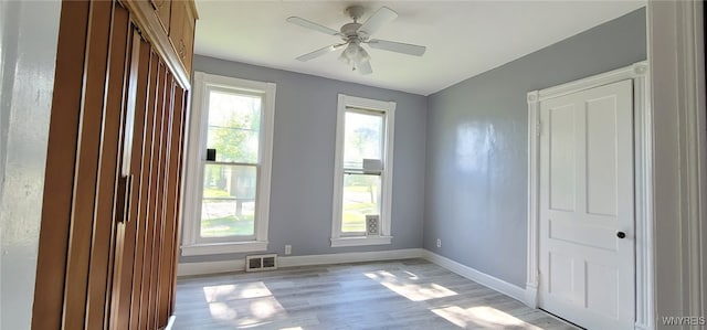 317 Portage Rd, Niagara Falls, NY 14303 - spare room with light wood-style floors, baseboards, and a ceiling fan
