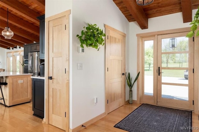 7317 Concord Rd, Concord, NY 14141 - entrance foyer featuring wooden ceiling with exposed beams, light wood-style floors, and baseboards