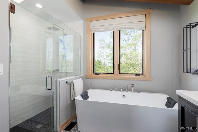 7317 Concord Rd, Concord, NY 14141 - full bath featuring vanity, a soaking tub, and a shower stall