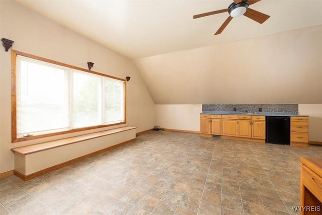 7317 Concord Rd, Concord, NY 14141 - additional living space featuring vaulted ceiling, baseboards, and a ceiling fan