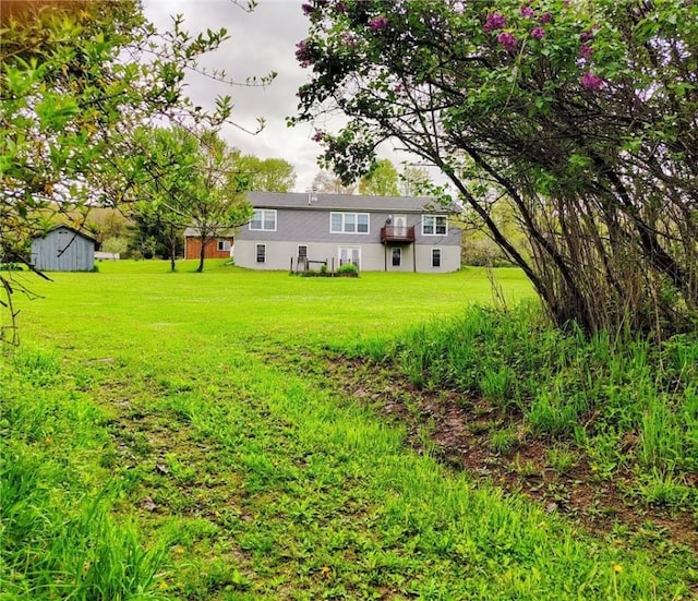 1058 County Highway 44, Sidney, NY 13775 - view of green lawn featuring a storage unit