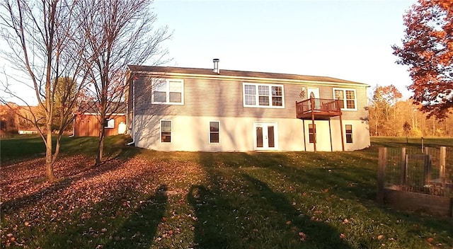 1058 County Highway 44, Sidney, NY 13775 - back of property featuring french doors, a lawn, stucco siding, and a deck