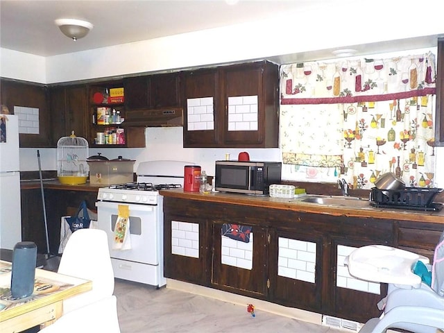 94 Locust St, Rochester, NY 14613 - kitchen featuring white appliances, under cabinet range hood, a sink, and open shelves