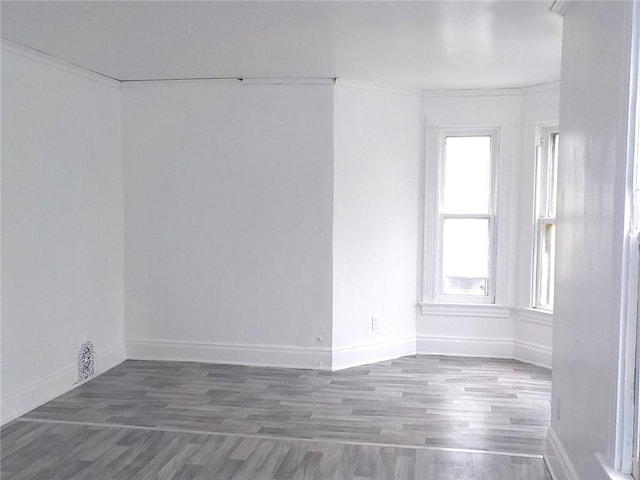 94 Locust St, Rochester, NY 14613 - spare room with baseboards, wood finished floors, and crown molding