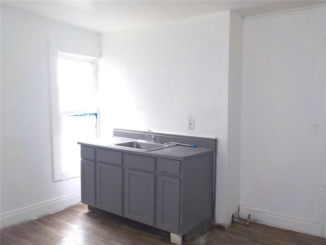 94 Locust St, Rochester, NY 14613 - kitchen with a sink, dark wood-style floors, and baseboards