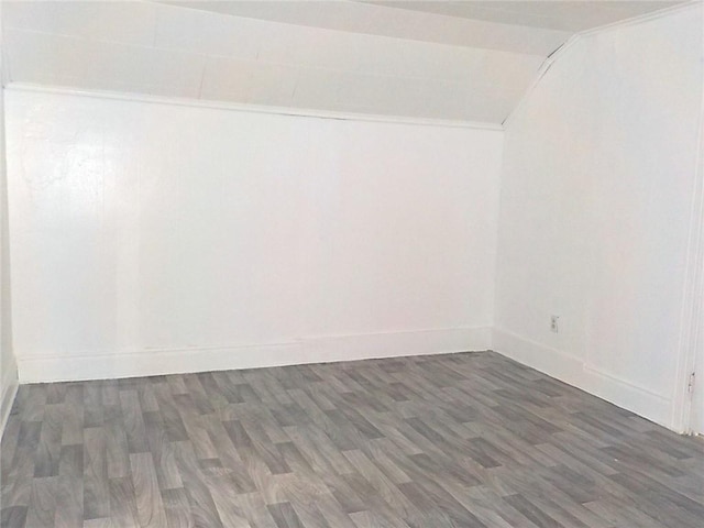 94 Locust St, Rochester, NY 14613 - additional living space featuring vaulted ceiling, baseboards, and wood finished floors