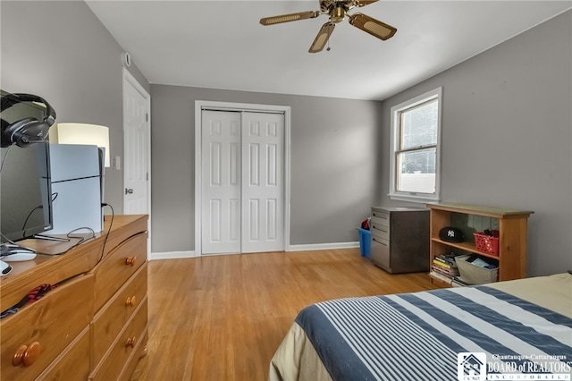 62 Thistle Ave, Tonawanda-Town, NY 14150 - bedroom with light wood-style floors, a closet, baseboards, and a ceiling fan