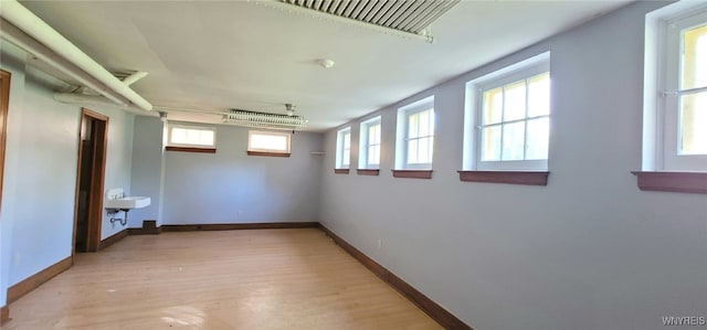 323 Portage Rd, Niagara Falls, NY 14303 - basement with light wood-style flooring and baseboards